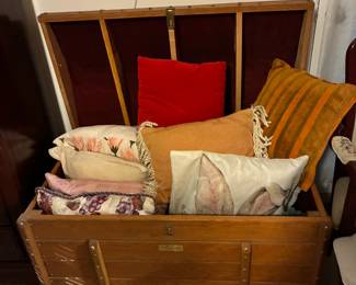 Trunk with throw pillows