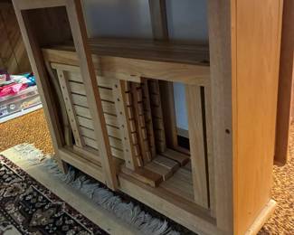 Folding table with chairs stored underneath