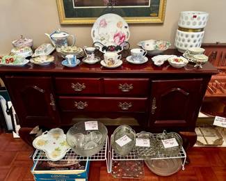 Buffet with lots of collectibles 