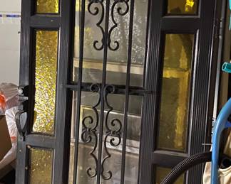 Storm/safety door with amber panes