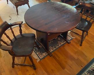 Round table & two chairs. Top flips up to become a seat.