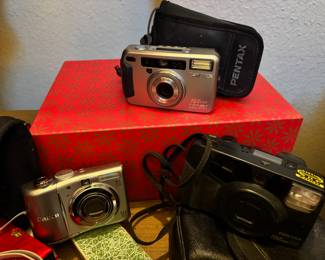 Pentax IQZoom 120Mi Film Camera, Canon PowerShot A1100 IS Silver 12.1MP Digital Camera, Pentax IQZoom 115M 35MM Film Camera