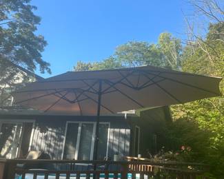 Large outdoor umbrella with table