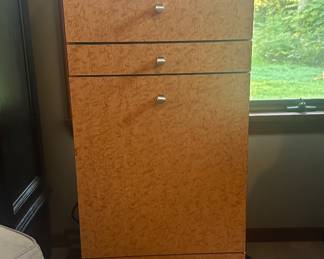 Talk drawered cabinet with outlets for charging inside a drawer