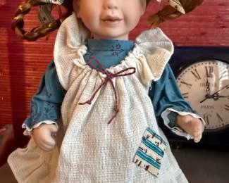 Doll by Duck House on a stand