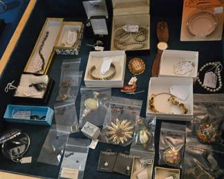 Assortment of Costume & Finer Jewelry including men's and women's watches; Sterling; Vintage American Indian pieces; Kenneth Cole; Sarah Coventry; Fraternal Pins and so much more!