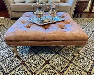 $400 - Leather Tufted Ottoman, distressed turned legs. 38"x38"
