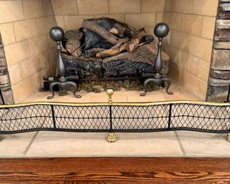 $500 Virginia Metalcrafters polished brass and iron fireplace fender (1980s). (One is currently listed on Chairish for $1675.) 49L x 13W x 10H