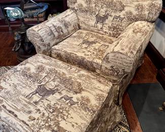 $400 Safari print upholstered club chair and ottoman. Chair is 42L x 34W x 36H. Ottoman is 30L x 24W x 17H.