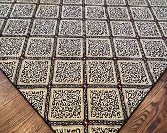 $450 - Custom Bound Leopard Print Rug appx. 9x14