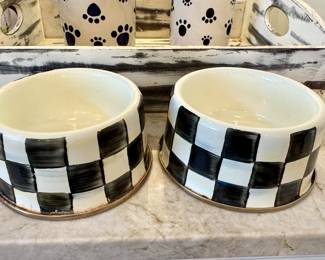 $48 Mackenzie Childs dog bowl (right) $16 Mackenzie Childs dog bowl (left) The one on the left has some wear.