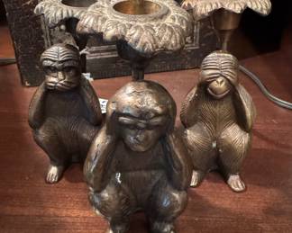 $48 Set of three monkey candle holders, approx. 5 inches tall.