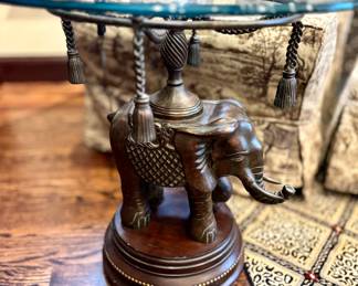 $250 Glass topped elephant table, 26D x 27H.