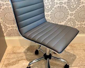 $42 Gray desk chair on adjustable rollers. 17L x 24W x 34H