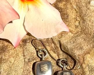 $18 Silver and gold colored earrings.