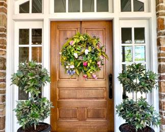 ($120 Large Spring door wreath, approx. 36 inches in diameter.) ($200/each, Faux topiaries in resin planters. 19L x 59H)