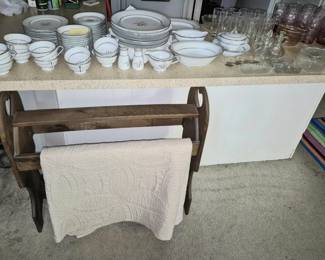 China sets, quilt rack, various quilts (not shown)