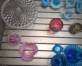 Fenton glassware and Roseville pottery