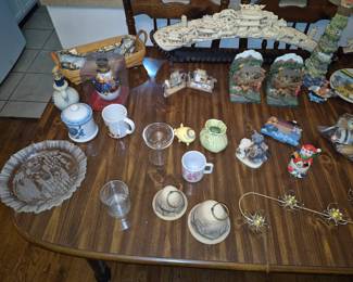 Random glassware, many Noah's Ark items, Longaberger basket, faux ivory items.