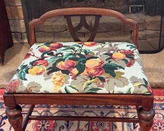 1920s vanity bench professionally recovered in new old stock Schumacher fabric. 