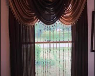 Draperies with rods. 