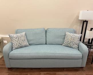 7' light blue fabric sofa