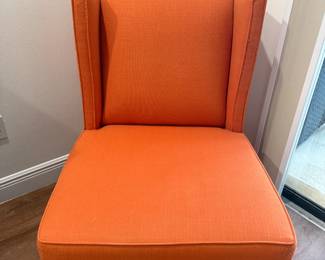 Super comfy burnt orange side chair sold 'as is'.  See next photo for damage. 