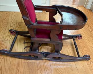 Victorian metamorphic high chair that converts from high chair to rocking chair.