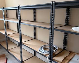 Several storage shelves in excellent condition