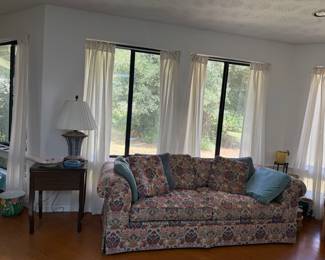 Nice couch, old sewing table used for lamp,