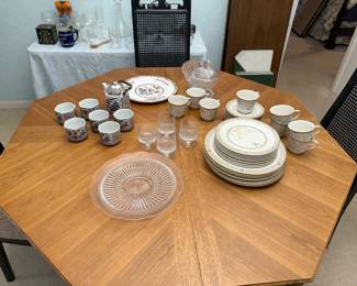 Dining table has leaves and pads