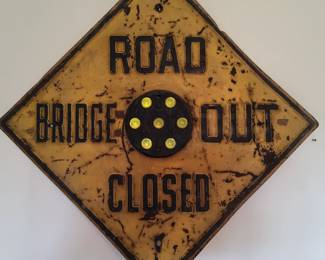 Road sign with cat eyes