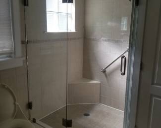 Glass shower surround