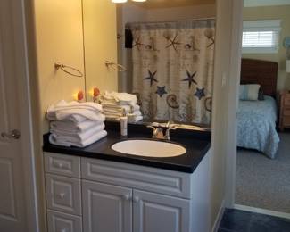 Bath vanity; mirror; vanity light