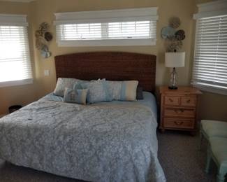 Queen bed; nightstand; table lamp