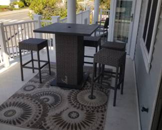 Patio dining set; outdoor rug