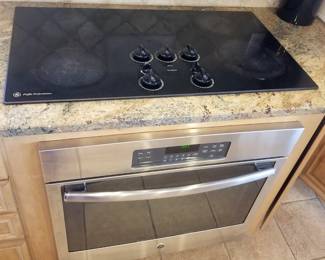 Glass cooktop; stainless steel oven