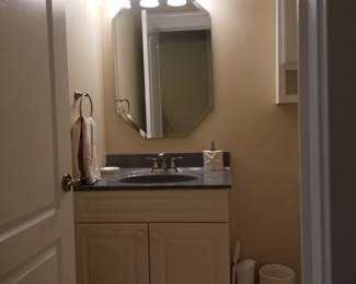 Bath vanity; mirror; vanity light