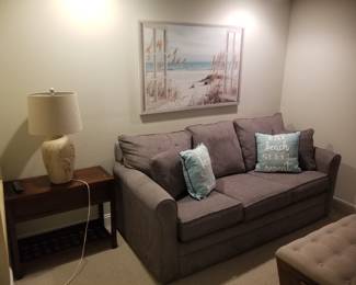 Sofa; end table; table lamp; artwork