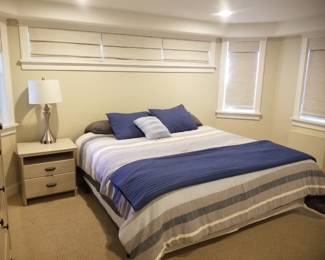 King bed; end table; table lamp