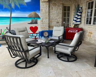 BROWN HOWARD LUXURY PATIO CHAIRS AND TABLE.