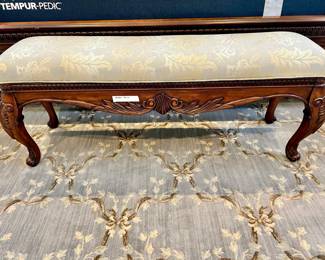 HOOKER BENCH UPHOLSTERED IN CUSTOM FABRIC.