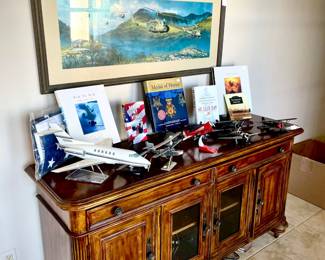 THOMASVILLE HEMINGWAY CONSOLE WITH MODEL AIRPLANES.  LIKE NEW CONSOLE.  WE HAVE 2.