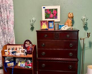 Antique chest of drawers, bookshelf art and cat decor 