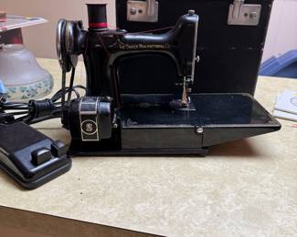 Vintage sewing machine and case