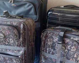 Four Pieces Of Luggage