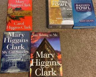 Three Mary Higgins Clark Books And Three Eoin Colfer Books