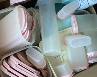Large Box Of Pink And Teal Colored Tupperware 