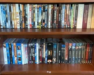 Two shelves of movies