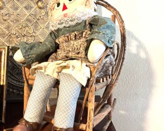 Raggedy Ann in wood chair
